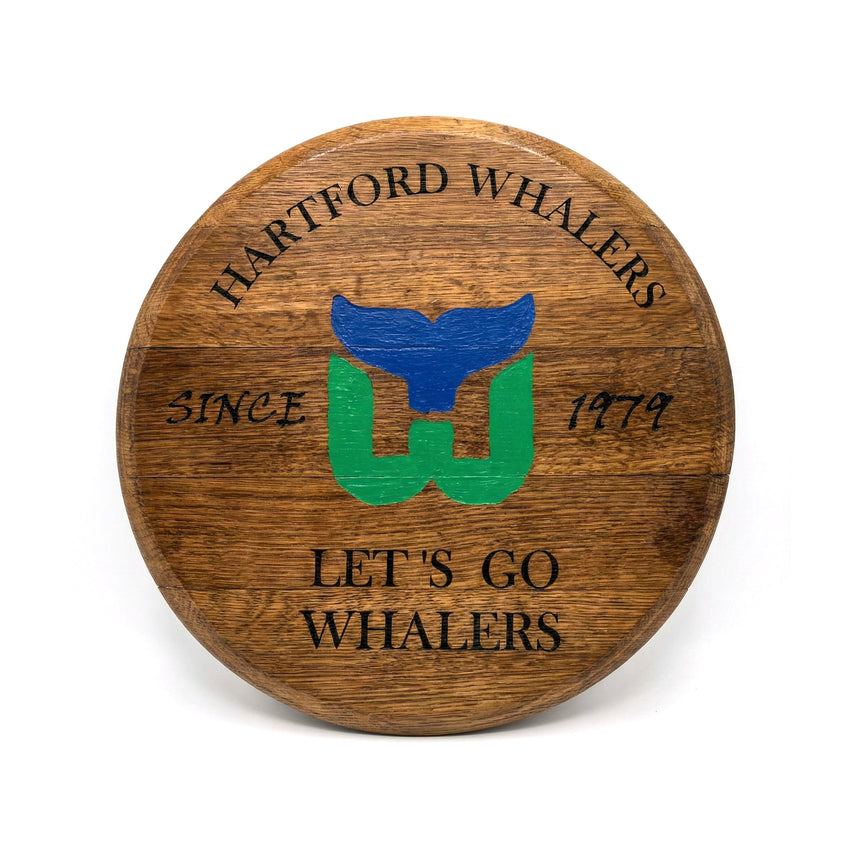 Small Barrel Head Art made from reclaimed bourbon barrel heads features the Hartford Whalers logo and "Since 1979, Let's Go Whalers" text—a unique handcrafted keepsake for true fans.