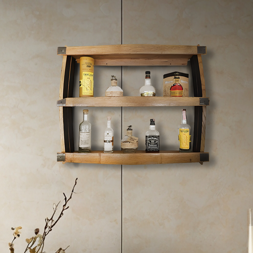 The 3 Tier Bar Shelf, made from hand-crafted solid wood barrel construction, fits 3 rows of spirits and adds rustic charm while offering functional liquor storage on any light beige wall.