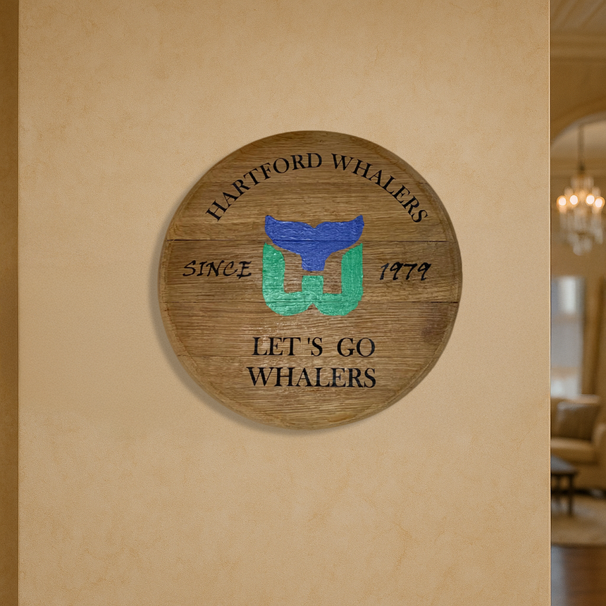 Locally crafted from reclaimed barrel heads, the Small Barrel Head Art features the Hartford Whalers logo and "Let's Go Whalers, Since 1979"—a unique handcrafted keepsake for any fan.