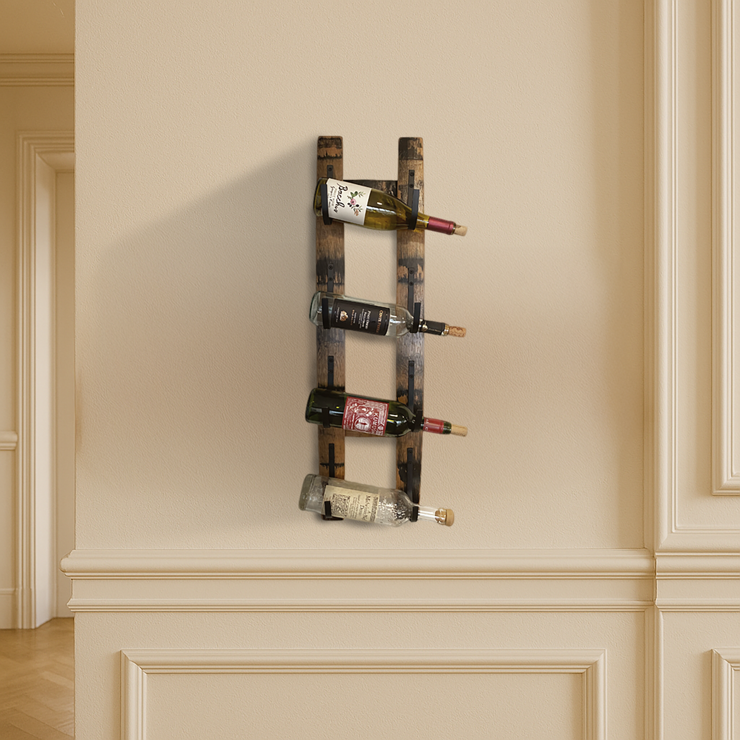 The Whiskey Stave Wine Holder displays four wine bottles on a beige wall, adding classic charm with its wall-mounted design crafted from whiskey staves.