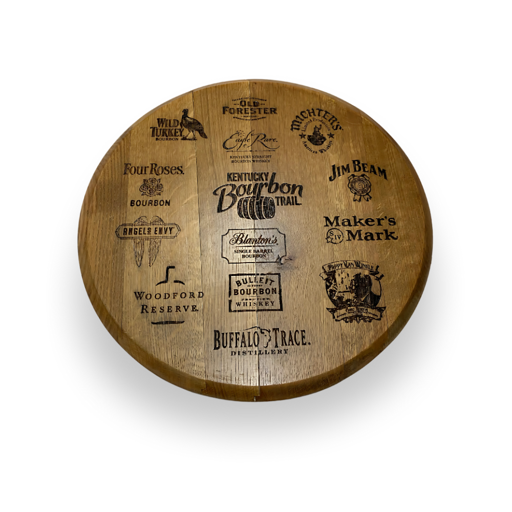The Whiskey Barrel Head Etch Bourbon Trail is a round wooden board made from whiskey barrel heads, engraved with a circle of Kentucky bourbon brand logos, celebrating the spirit of Kentucky’s Bourbon Trail.