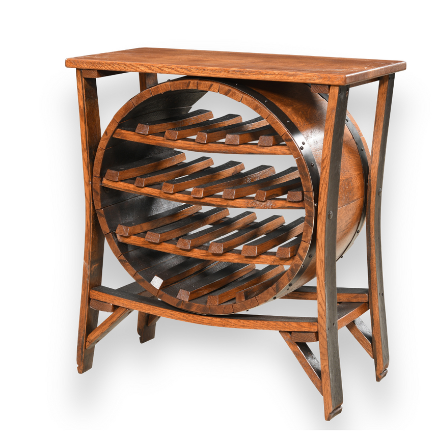The Wine Rack Table features a rustic design with a circular center and shelves, crafted from a reclaimed wine barrel to hold wine bottles. Shown on a white background.