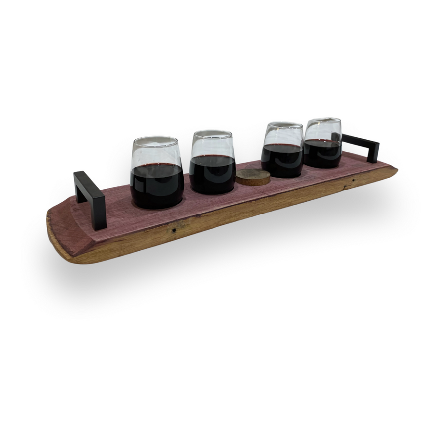 Four glasses of red wine on the Wine Barrel Serving Board, featuring black metal handles and crafted from reclaimed barrels, isolated on a white background.