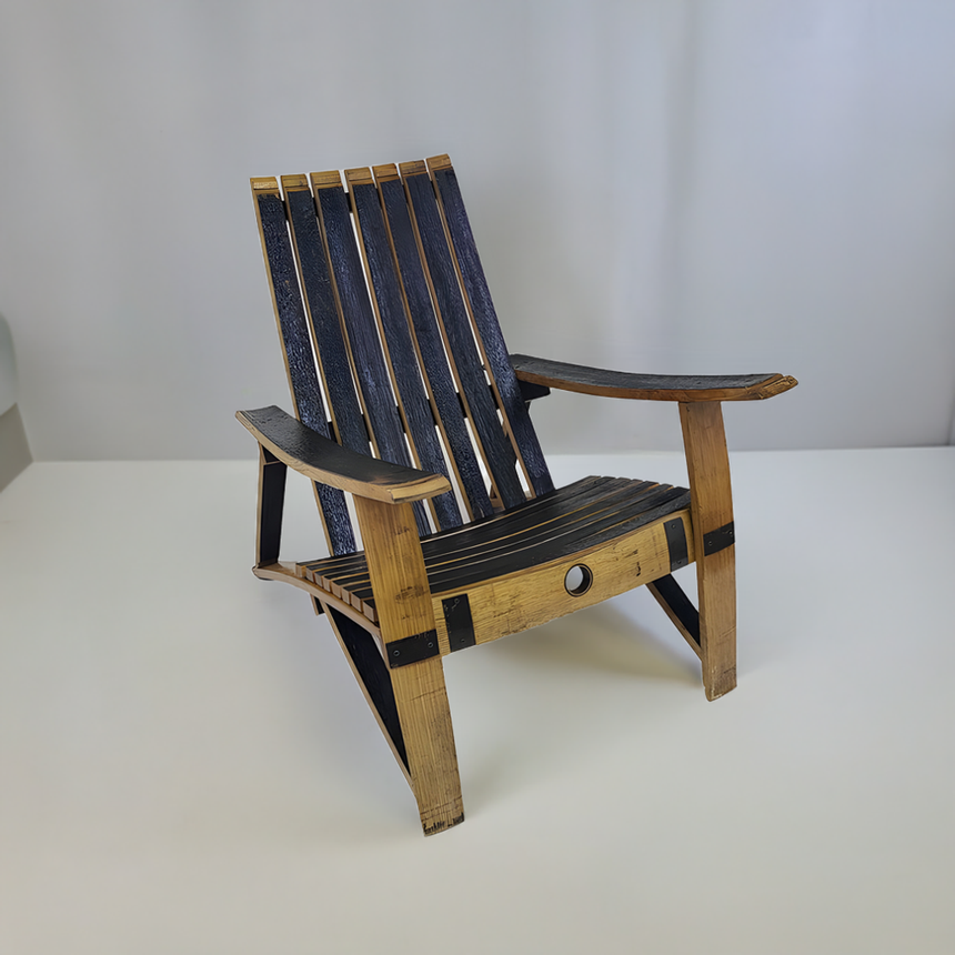 Adirondack Lounge Chair, hand made from solid wood barrel staves with slatted seat and backrest, showcases dark and light wood tones.