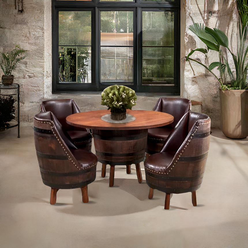 Barrel Table with Legs and four Upholster Barrel Stool Sofas, inspired by whiskey barrels, arranged by a window and topped with a plant centerpiece.