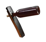 The Bottle Balancer is crafted from bourbon barrel staves, resembling a hammer, and rests a dark brown bottle on a black wooden plank.