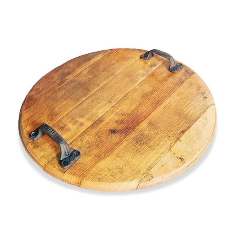 Charcuterie and Cheese Round Wooden Serving Board, Full Size, with natural wood finish and black metal handles on a white background. Hand Made Solid Wood Construction.