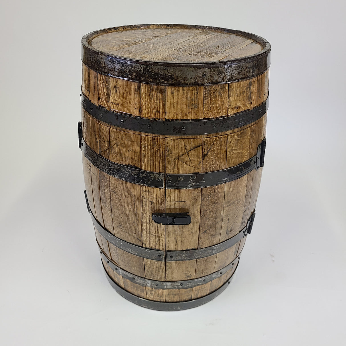 A Deluxe Barrel Bar and Cabinet - C001, priced between $795 and $845, characterized by its wooden barrel design with metal bands and a spout exuding rustic elegance, stands upright against a plain white background, making it the perfect addition to enhance the charm of your setup.