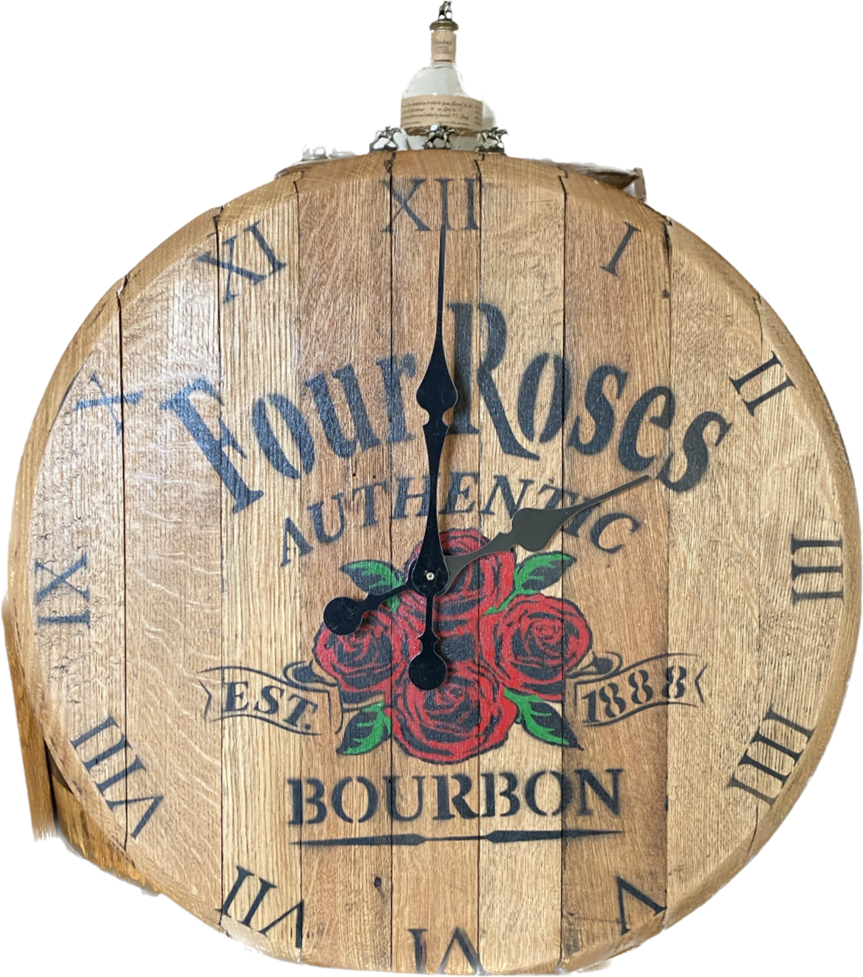 The Four Rose Clock, priced at $150.00, is a round wooden whiskey barrel clock that resembles a bourbon barrel. It features the "Four Roses" logo, Roman numerals, and red roses, offering the perfect blend of rustic charm and elegance.