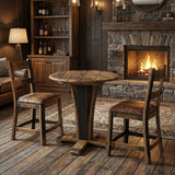 Rustic dining area with a wooden table and two chairs near a stone fireplace, complemented by an End Table on the side and wooden shelves.
