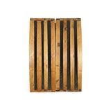 A hand-made solid wood dartboard cabinet with alternating light and dark barrel staves, designed to fit a standard tournament dart board, shown from above on a white background.