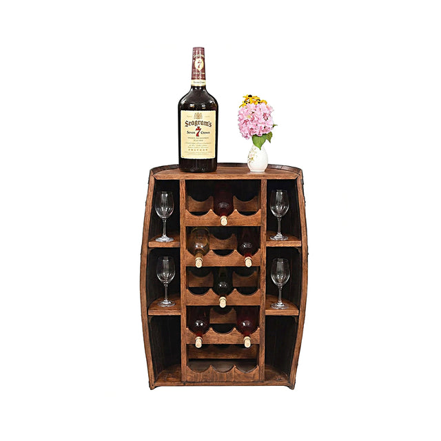 The Half Barrel Bottle Holder wine rack holds bottles, glasses, and a whiskey bottle, with space on top for decor like a pink flower vase—an ideal rustic touch for your home bar.