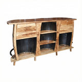 The 3 Barrels Bar Table is crafted from repurposed barrels, featuring shelves and curved staves—a unique whiskey barrel bar table and standout man cave furniture for your home.