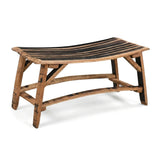 The Barrel Stave Bench features a curved slatted seat and natural wood finish, crafted in a rustic style inspired by classic whiskey barrel furniture.