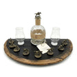 The Bar Tray fits a Blanton's bottle and horse cork stoppers (corks not included); its hand made solid wood barrel construction creates a charming display for your whiskey setup.