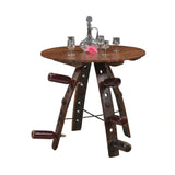 The Barrel Stave Table features a round wooden design with wine bottle holders in the legs, topped with glasses and a decanter—a unique piece of handcrafted bourbon table artistry.