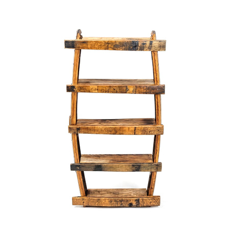 The Small Spice Rack is a wooden bookshelf with five uneven, rustic shelves, resembling a spice rack, shown from the front against a white background.