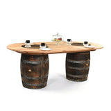 The Double Barrel Table features two whiskey barrel bases and a tabletop set with plates, cups, and a central cake stand.