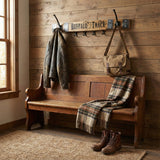Rustic entryway with a wooden bench, plaid blanket, boots, coats, bag, and a Buffalo Trace inspired Coat & Key Wooden Wall Mounted Rack featuring 2 double coat hooks and 4 key hooks.