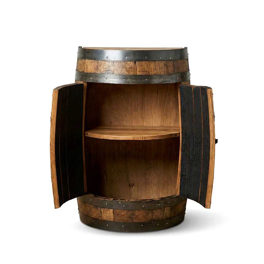 The Half Barrel Cabinet with Door and Shelves is a hand-made solid wood mini bar featuring two doors and an interior shelf—ideal as unique bourbon barrel furniture or rustic home decor. Isolated on white.
