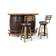 The Barrel Bar Table with Chairs features a wood bar made from two barrels and a matching wood top, plus two coordinating barstools—bringing rustic whiskey barrel charm to any space in your home.