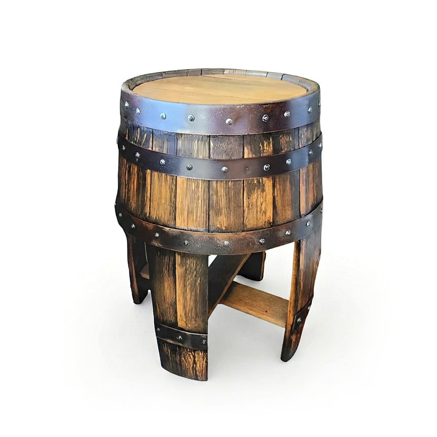 The End Table with Stave Legs features hand-made solid wood barrel construction and metal bands, inspired by whiskey barrels—perfect for adding rustic charm to any space.