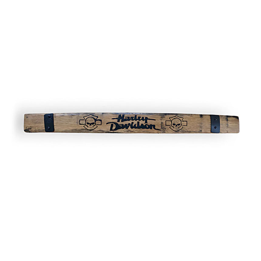 The Barrel Staves are wooden planks made from reclaimed oak bourbon barrels, featuring "Harley Davidson" text, skull designs, and two black metal bands.