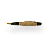 The Barrel Pen is a handcrafted executive pen featuring a wooden barrel, gold accents, and a black tip, displayed on a white background.