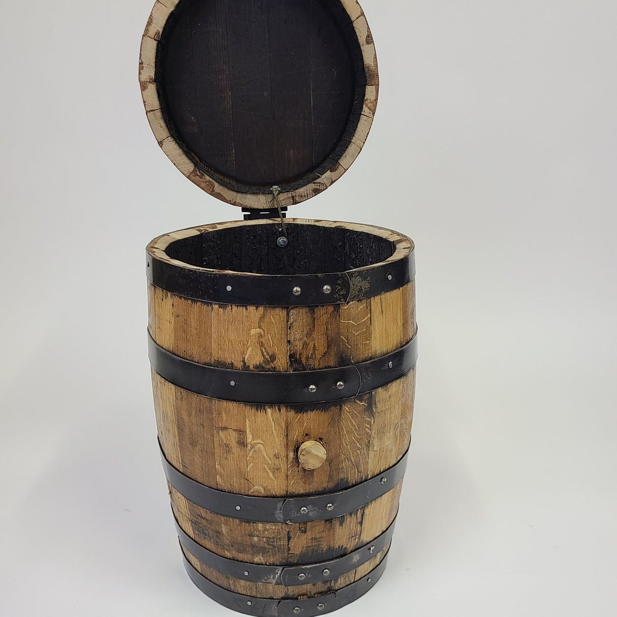 A Small Barrel with Lift Up Lid - U002, priced at $200.00, stands upright against a plain white background. This small wooden barrel, adorned with black metal bands and featuring a convenient lift-up lid, is the perfect versatile storage solution for any room in your home.