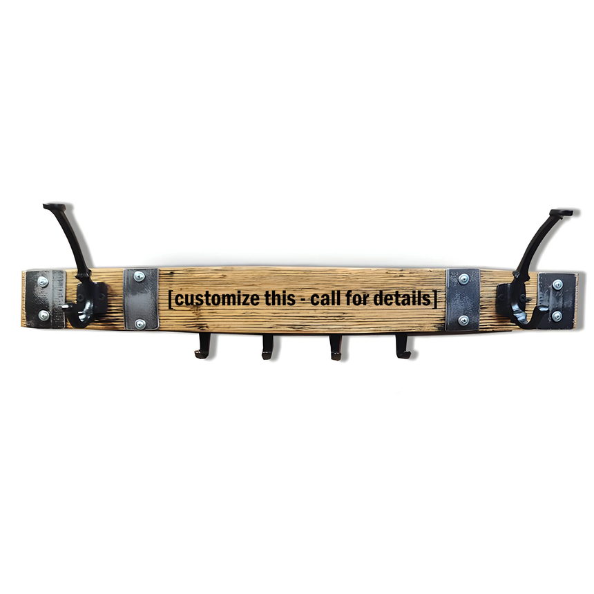 Wall-mounted wooden coat and key rack made from reclaimed whiskey barrel wood, featuring 2 double coat hooks, 4 key hooks, and a customizable text panel reading "customize this – call for details.