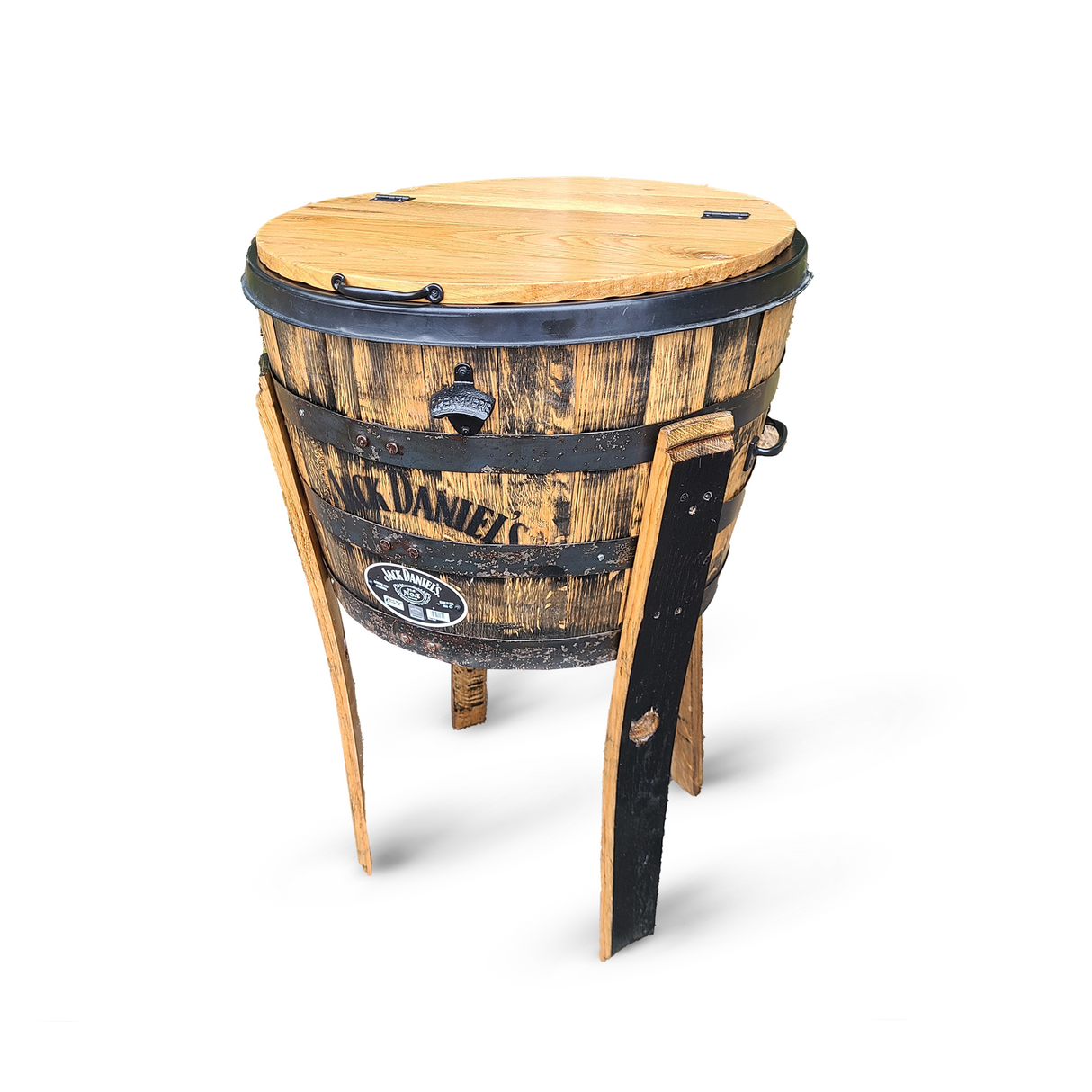 The outdoor bottle cooler, resembling a classic bourbon barrel with Jack Daniel's logo, lid, and metal bands, stands on three legs. It features handmade solid wood barrel construction and fits whiskey, wine, and beer bottles while providing superior beverage insulation.