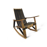 Rock in style with the Whiskey Barrel Stave Adirondack Chair Rocker, featuring a slatted black seat and backrest. Crafted with a brown frame and wide armrests, its ergonomic design ensures comfort and relaxation through every soothing sway.