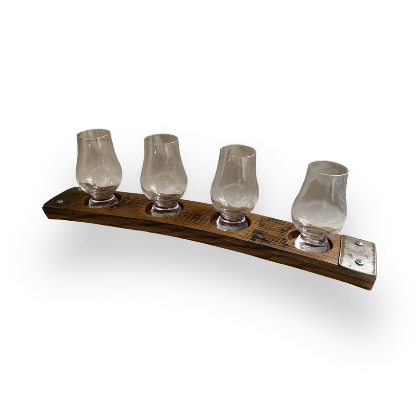 The Whiskey Tasting Flight Board for 4 Glasses features hand made solid wood construction, providing a stylish and functional way to serve whiskey and elevate your tasting experience.
