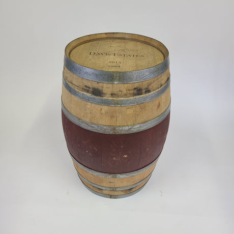 The Wine Barrel - U004, priced between $225.00 and $275.00, is a handcrafted wooden barrel with metal bands, featuring the inscription "Davis Estates 2015" on the top, ideal for proudly displaying the meticulous aging process.