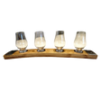 Four whiskey glasses rest empty and evenly spaced on the Whiskey Tasting Flight Board for 4 Glasses, crafted from hand-made solid wood.