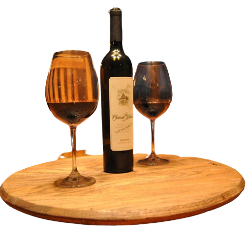 A Lazy Susan Round Swivel Tray, made from hand-crafted solid wood barrel head, elegantly displays a wine bottle and two filled glasses with a food-safe finish.