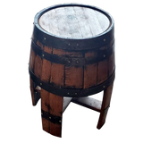 The End Table with Stave Legs, crafted from solid wood barrel construction, exudes rustic elegance with its round seat and metal bands reminiscent of whiskey barrels, blending charm with functionality.